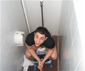 Hot, big arsed, muscular athletes, caught on the pot